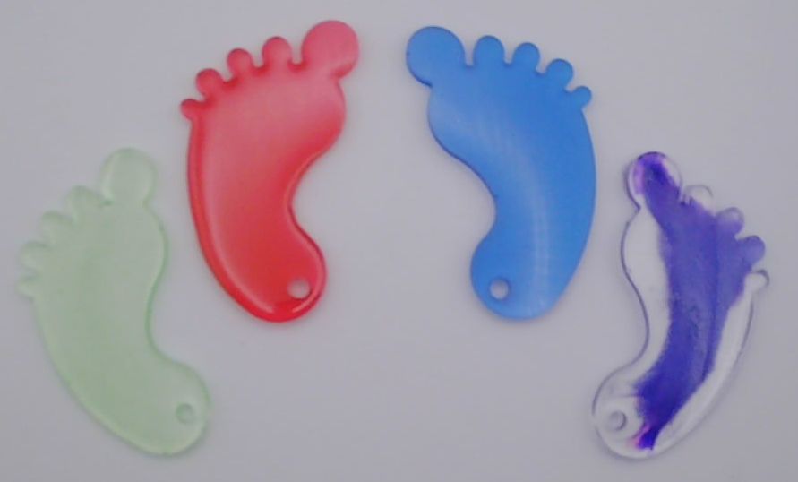 Foot Print key chains made with resin.  Can be customized with different colors or mixed colors.