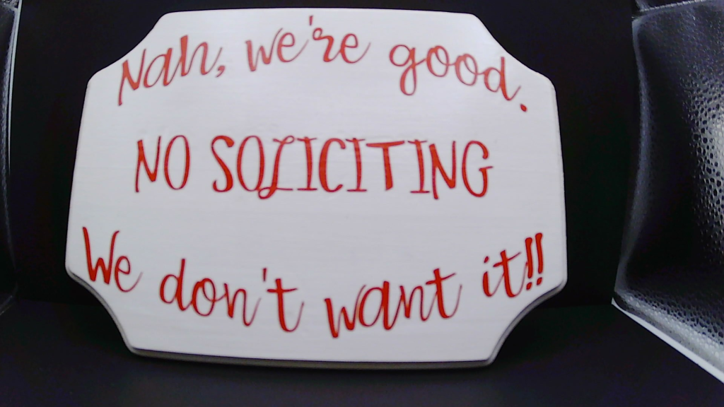 No Soliciting sign.